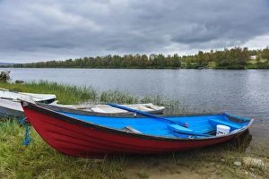 Images Dated 29th January 2013: Sweden, Norrbotten. Boats along the Laino River in Lannavaara