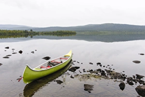 Fredrik Norrsell Prints: Sweden, Norrbotten, Torne River. Canoe in tranquil waters
