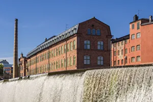 Industry Prints: Sweden, Norrkoping, early Swedish industrial town, factory buildings and waterfall