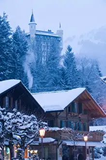 Images Dated 20th February 2005: SWITZERLAND-Bern-GSTaD: Town View & Palace Hotel / Dawn / Winter