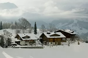 Images Dated 20th February 2005: SWITZERLAND-Bern-SAANEN (Area around Gstaad): Ski Chalet Under Fresh Snow / Winter