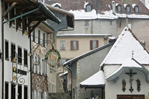 SWITZERLAND-Fribourg-GRUYERES: Buildings along Main Street / Winter