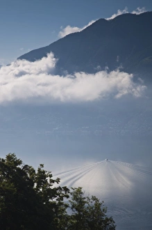 Images Dated 1st June 2009: Switzerland, Ticino Canton, Locarno. High angle view of lake and ferry, morning