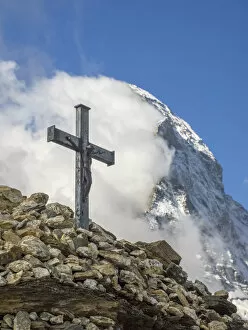 Switzerland, Zermatt, Matterhorn with clouds and cross