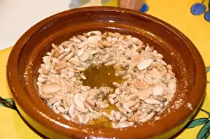 Sweet Prints: Tangier Morocco honey and almond dessert in a clay dish at a restaurant