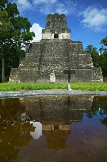 Temple II with reflection in water at Tikal Ruins, Guatemala