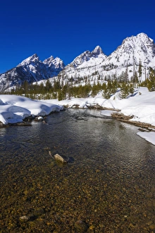 Brook Prints: The Tetons in winter above Cottonwood Creek, Grand Teton National Park, Wyoming USA