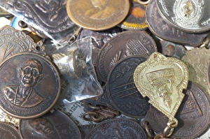 Images Dated 27th February 2012: Thailand, Bangkok Amulet Market. Local market filled religious amulets, charms, talismans