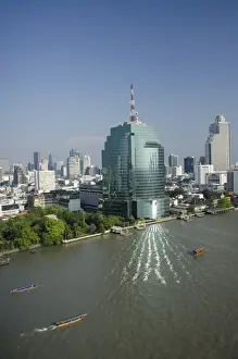 Riverfront Prints: Thailand, Bangkok. Downtown Bangkok skyline view with Chao Phraya river