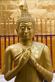 Images Dated 22nd March 2014: Thailand, Chiang Mai Province, Wat Phra That Doi Suthep. Buddha statue