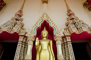 Mirrored Prints: Thailand, Ko Samui (aka Koh Samui). Wat Plai Laem, Buddhist temple. Golden Buddha statue