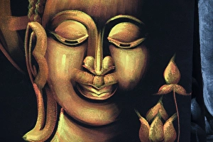 Thailand, Samui Island, Ko Samui. Traditional handicrafts, hand painted Buddha face