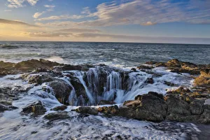 Thors Well with surf cascading into the well along the Oregon coastline