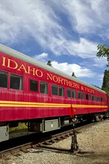 The Thunder Mountain Line scenic tourist train traveling along the Payette River