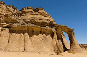 Barren Prints: Tin Ghalega rock formation, Red Rhino Arch. Wadi Teshuinat, Akakus, Fezzan, Libya