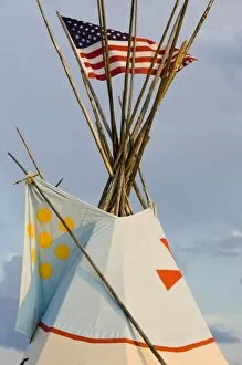 Tipi with American flag at the North American Indian Days celebration in Browning Montana