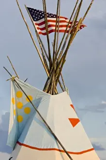 Browning Prints: Tipi with American flag at the North American Indian Days celebration in Browning Montana