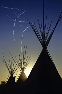 Images Dated 1st September 2006: Tipis at sunset at Browning Montana (lightning added digitally)