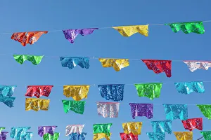 Todos Santos Prints: Todos Santos, Baja California Sur, Mexico. Festive colorful banners over a street