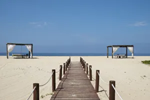 South America Prints: Todos Santos, Mexico. Boardwalk and palapas, a traditional Mexican shelter