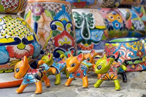 South America Prints: Todos Santos, Mexico. Colorful pottery cats and other items for sale