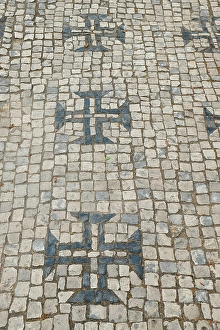 Images Dated 2nd January 2024: Tomar, Portugal. Traditional cobblestone sidewalk but with Templar crosses