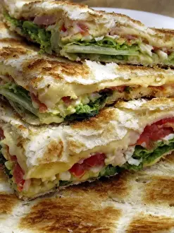 Cheese Prints: Tostado is a tipical Argentine snack: toasted bred stuffed with cheese, ham, tomatos