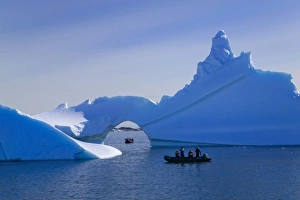 Natural Arch Prints: Tourist boat with naturally formed iceberg arch, American Palmer Station, Antarctica
