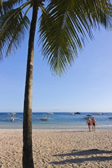 Filipino Prints: Tourists and palm tree on the beach, Bohol Island, Philippines