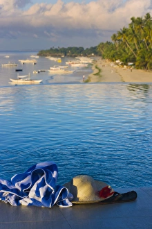 Filipino Prints: Towel and straw hat on the beach, Bohol Island, Philippines