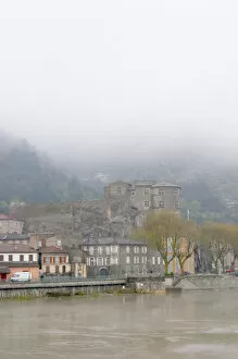 Images Dated 16th April 2005: The town Tournon across the Rhone river with the Chateau de Tournon. under snow