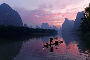 Traditional Chinese cormorant fisherman, Li River, near Xingping, China