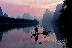 Asia Gallery: Traditional Chinese cormorant fisherman, Li River, near Xingping, China