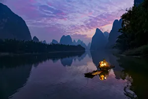 Traditional Chinese cormorant fisherman, Li River, near Xingping, China
