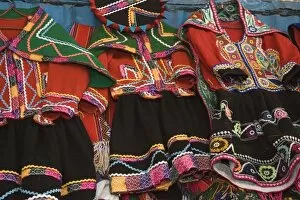 Images Dated 16th May 2005: Traditional clothing for sale in market, Cuzco, Peru