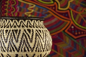 Part Prints: Traditional hand made Panamanian handicrafts. Embera Indian grass basket in front