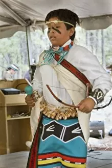 Traditional Hopi dancer demonstrating a Hopi hunting dance with bow and quiver during