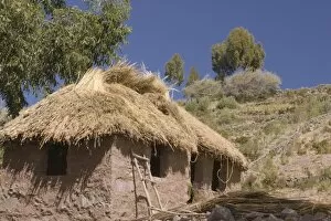 Traditional house with thatched roof, Taquile Island (also known as Isla Taquile)