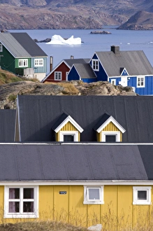 Images Dated 31st August 2007: Traditional houses and iceberg Tasiilaq (Ammassalik) Greenland
