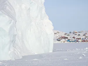 Greenland Prints: The traditional and remote Greenlandic Inuit village Kullorsuaq located at the Melville