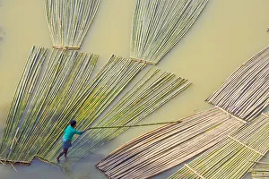 Bamboo Prints: Transporting bamboo timber on the river, Chittagong, Bangladesh