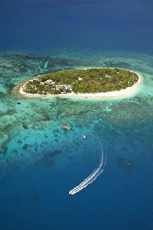 Images Dated 24th October 2011: Treasure Island Resort and boat, Mamanuca Islands, Fiji, South Pacific - aerial