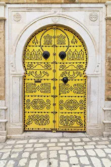 Decorative Prints: Tunis, Tunisia. A decorated door in a keyhole arch, also known as a Moorish Arch