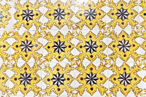 Decorated Prints: Tunis, Tunisia. Yellow decorative tiles on a house near the Tunis Souk