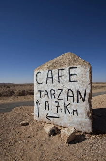 Tunisian Prints: Tunisia, Ksour Area, Route C105, sign for Cafe Tarzan