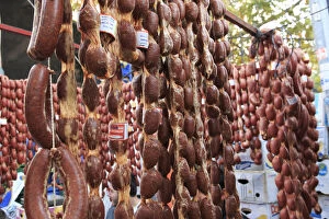 Turkey, Izmir Province, Kusadasi. Meat vendor at outdoor market