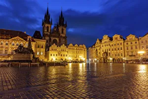 Town Square Prints: Tyn Church at dawn on wet cobblestones in Old Town Square in Prague, Czech Republic