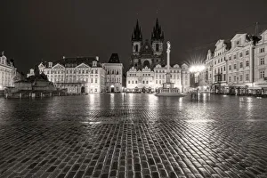 Town Square Prints: Tyn Church at dawn on wet cobblestones in Old Town Square in Prague, Czech Republic