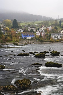 Images Dated 8th November 2005: Typical Swiss homes along Rhein River on foggy autumn day, Schaffhausen, Switzerland