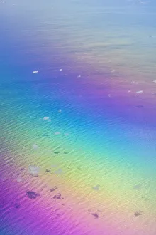 U. S. Virgin Islands, St. Thomas. Aerial view of clouds and rainbow over the Caribbean Sea
